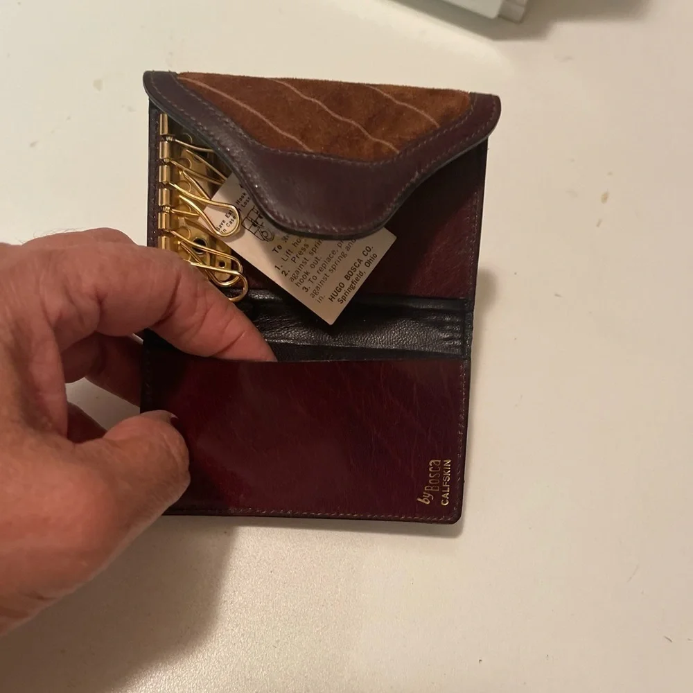 Bosca beautiful new keyholder with packets. seude with brown leather